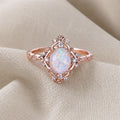 Anello Fiore con Opale Bianco Ovale