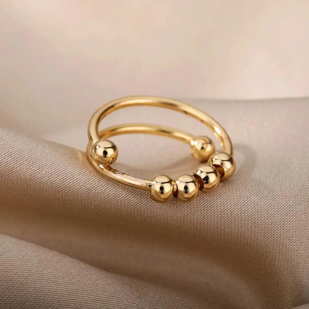 Anello Fidget con Perline Girevoli