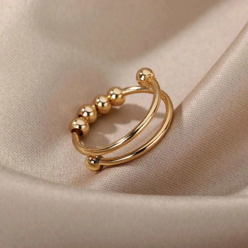 Anello Fidget con Perline Girevoli