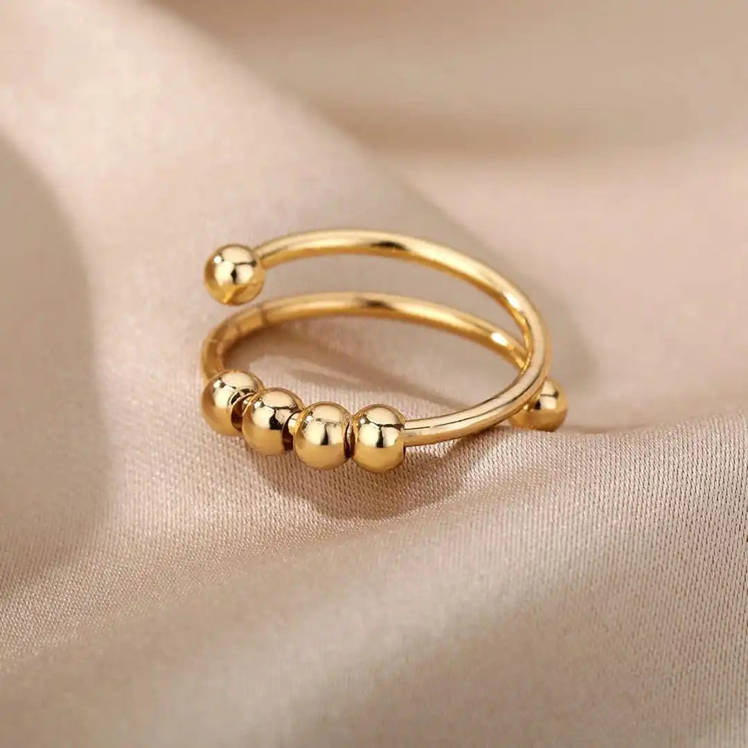 Anello Fidget con Perline Girevoli
