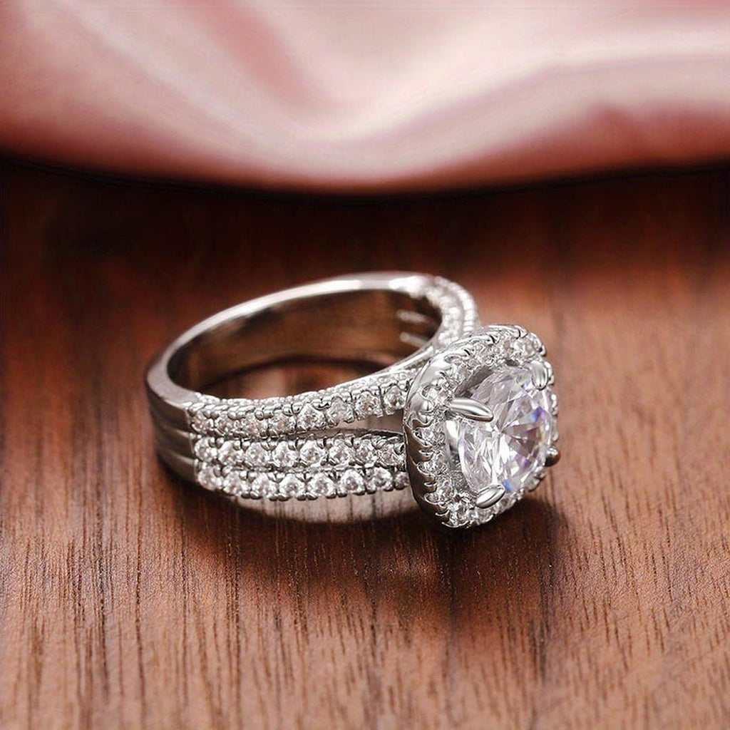 Anello Statement Cushion con Halo Pavé